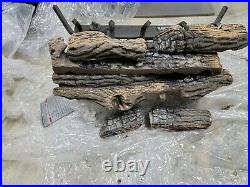 Gas logs for fireplace, Barely used. 33,000 BTU LOOKS/WORKS GREAT (PROPANE USED)