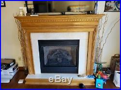 Monessen Ventless fireplace with gas attachement, logs, and Oak Mantle